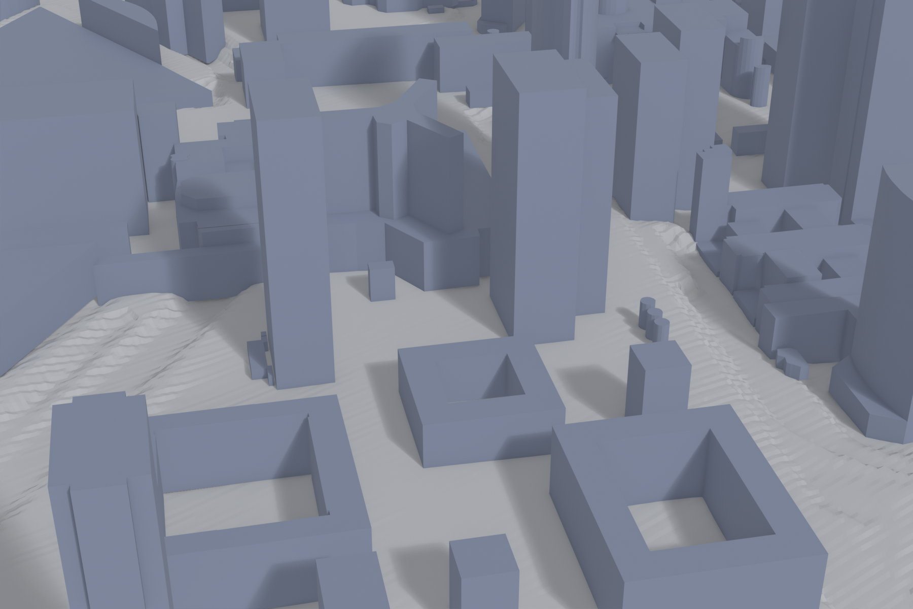 Maquette 3D vue de près : bâtiments extrudés à leur hauteur réelle, avec leurs cours intérieures, posés sur un terrain triangulé